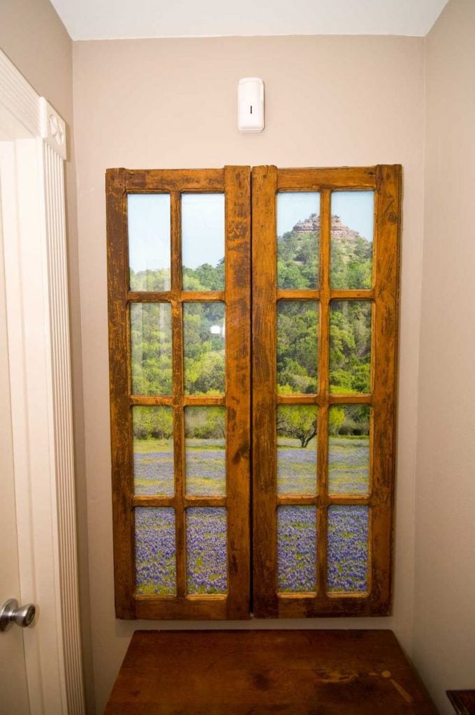 Rustic Framed Backlit Window with Mountain View