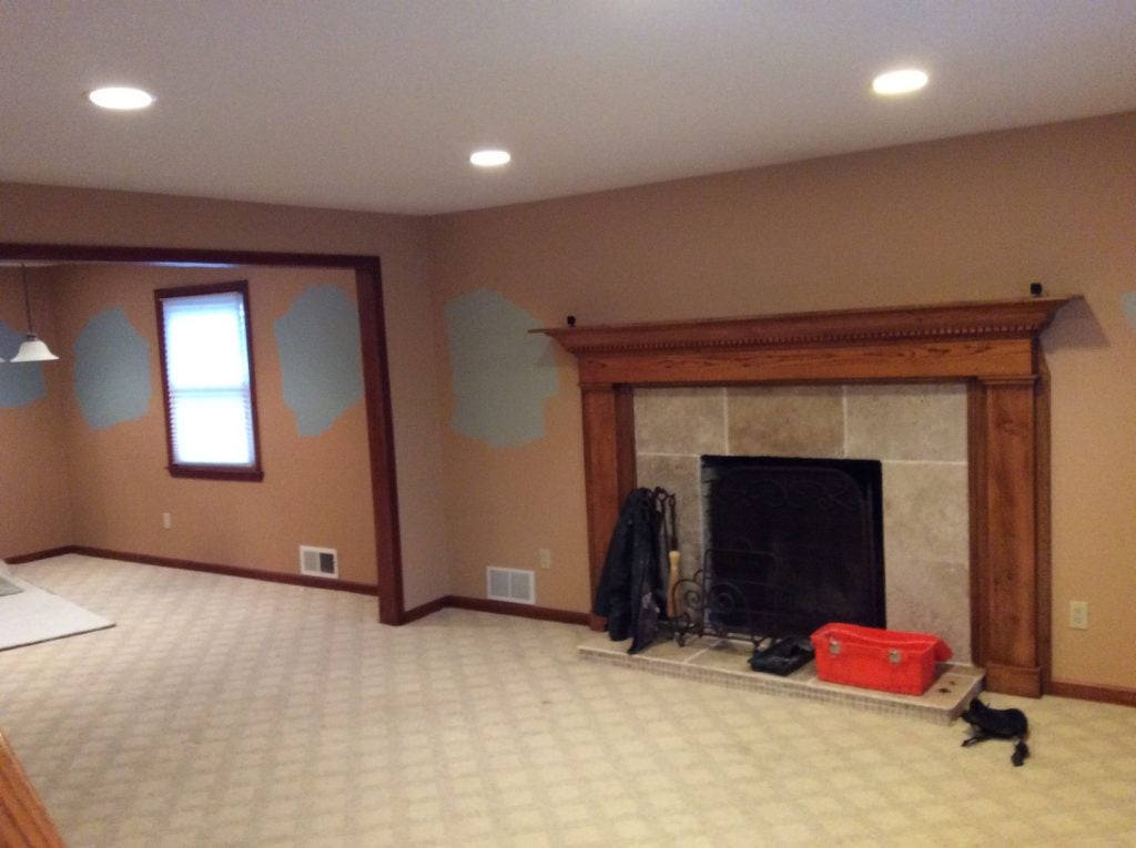 Carpeted Floors Around Fireplace Before