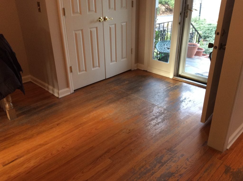 Tell-tale grey spots that require full sanding