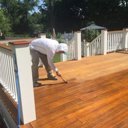 Hand Staining the Mahogany Deck