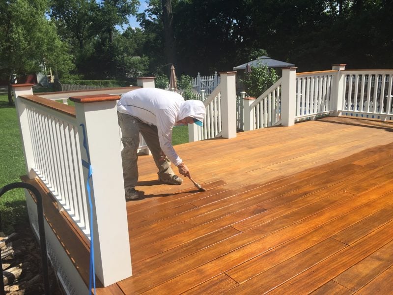 Hand Staining the Mahogany Deck