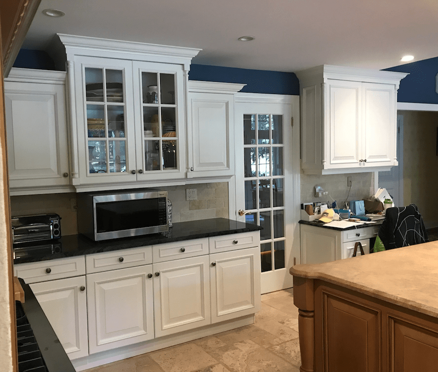 White Kitchen Cabinets Paired With Navy Walls - Monk's in NJ