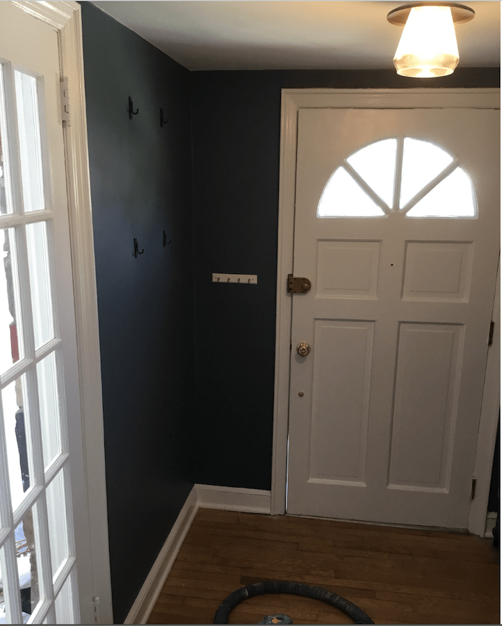 After front door repairs and new interior painting