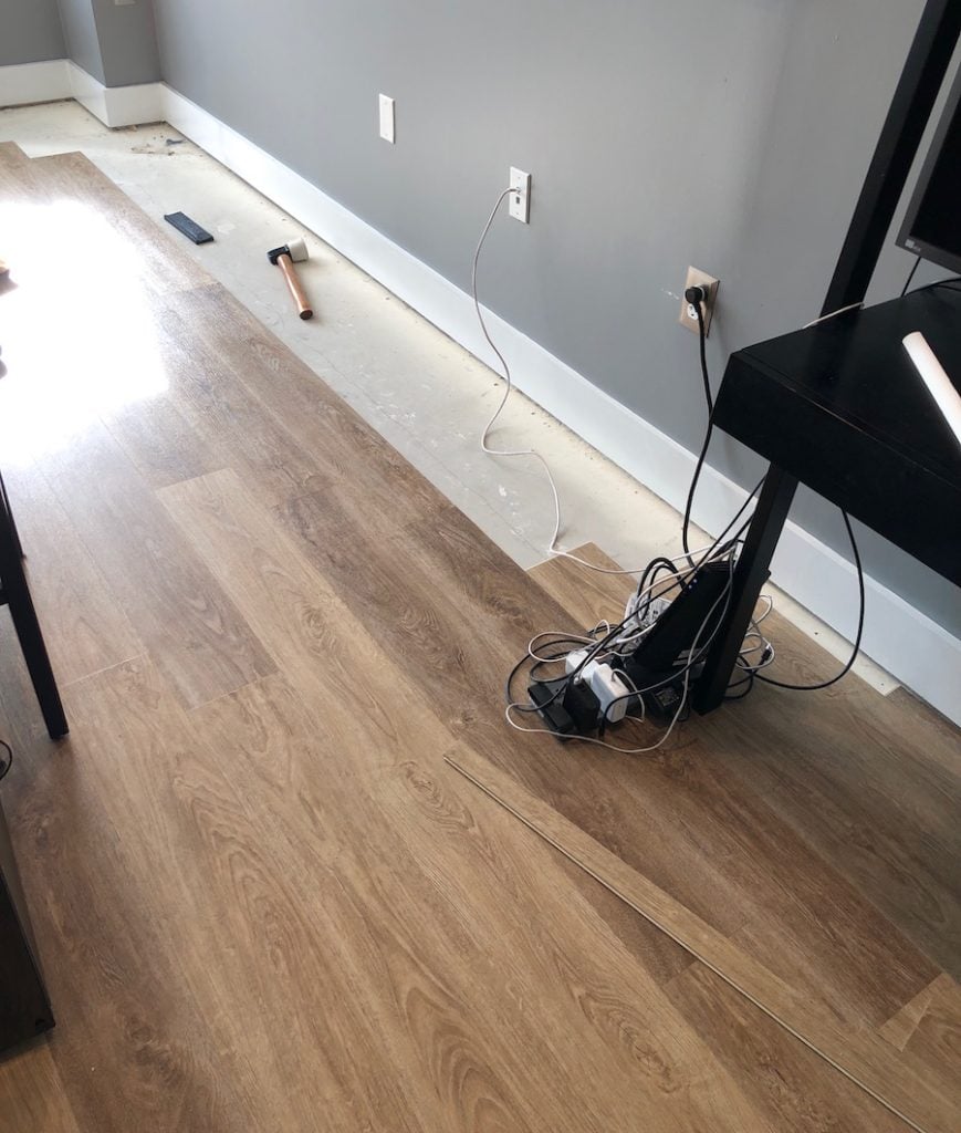New Luxury Vinyl Tile Planks Being Installed