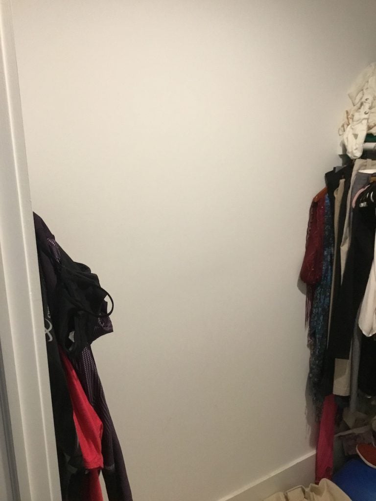 Closet With Open Wall Space in Back