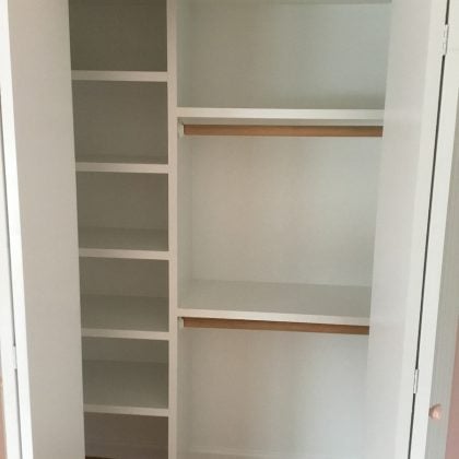 Girl's Bedroom Closet with Shelving and Fresh Paint