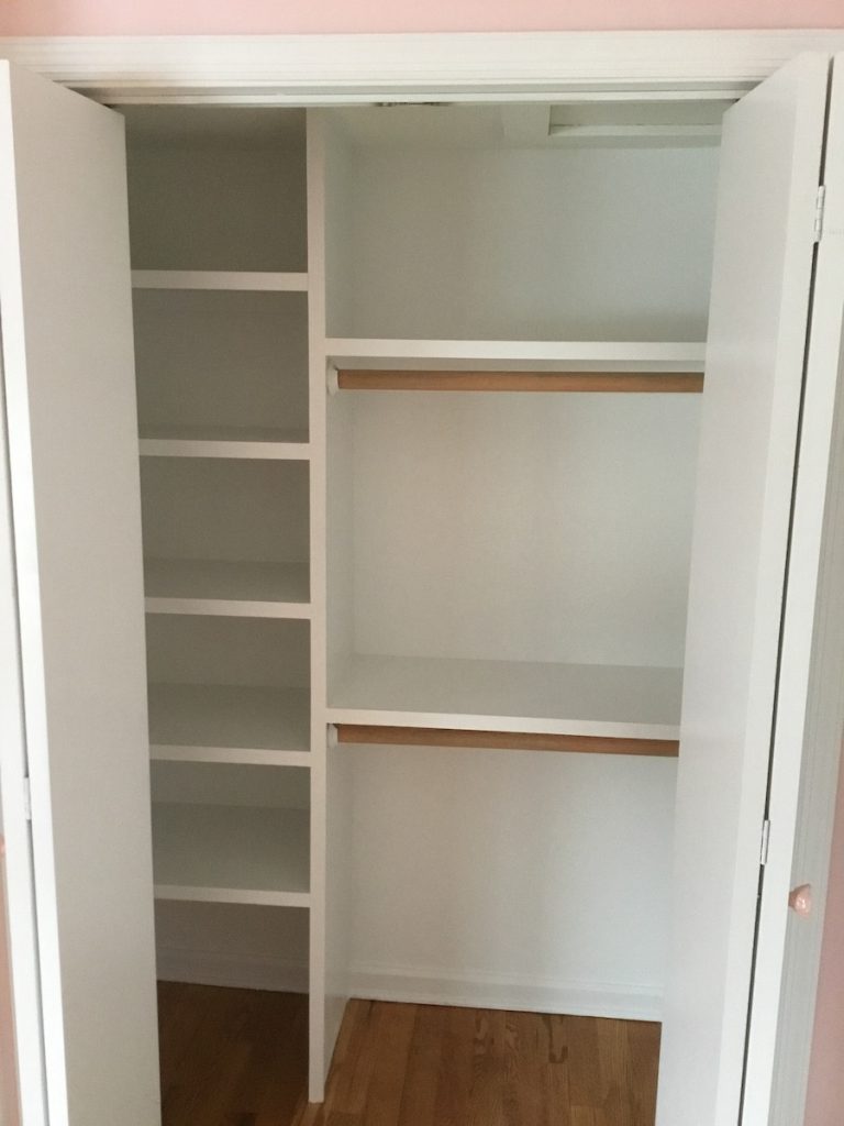 Girl's Bedroom Closet with Shelving and Fresh Paint