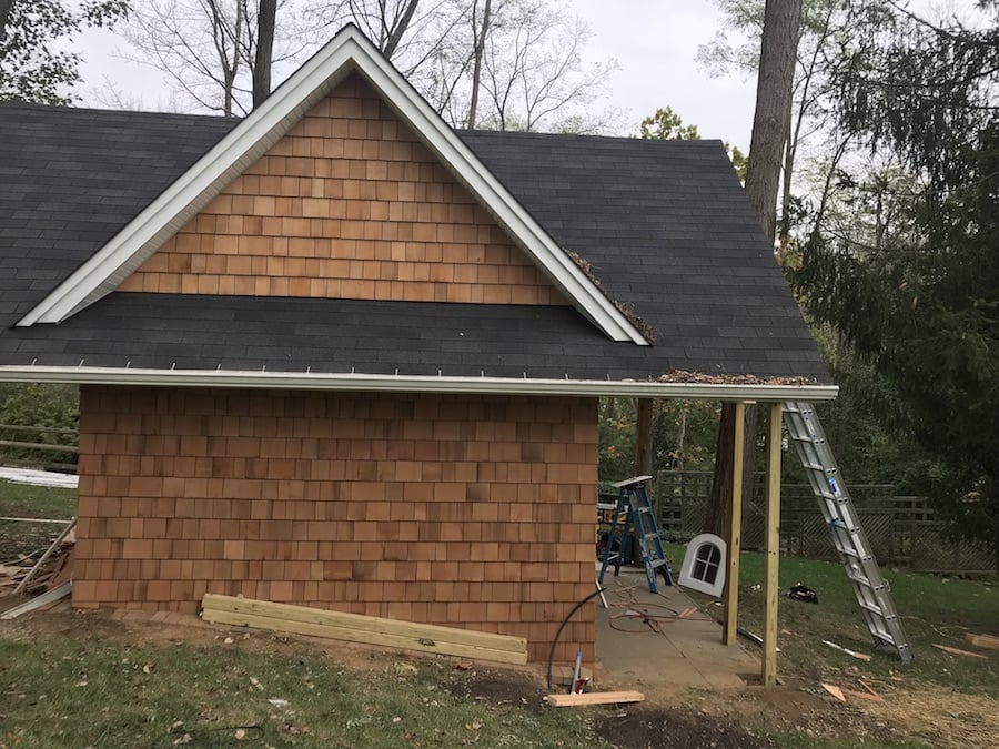 Siding complete; support beams in place
