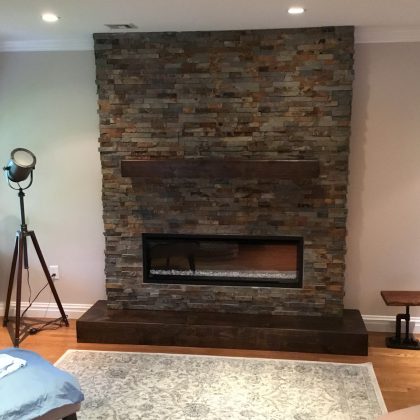 Stacked Stone Fireplace in Master Bedroom