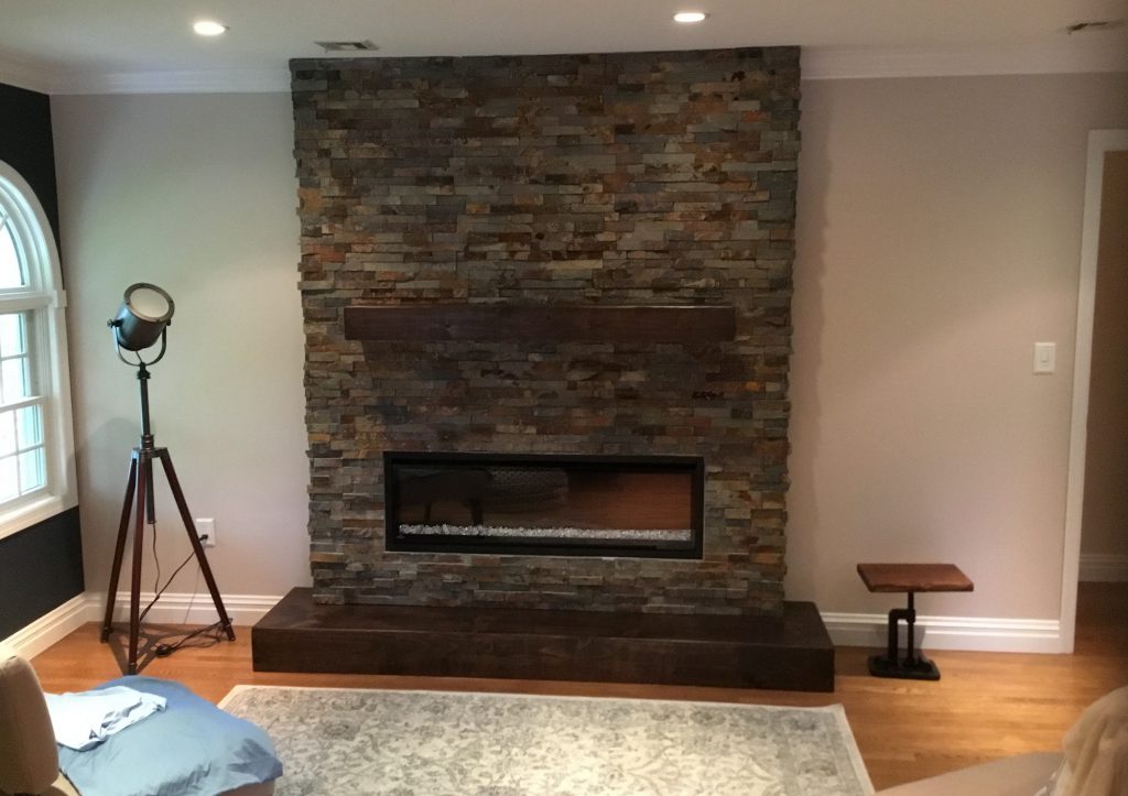 New Stacked Stone Hearth with Electric Fireplace