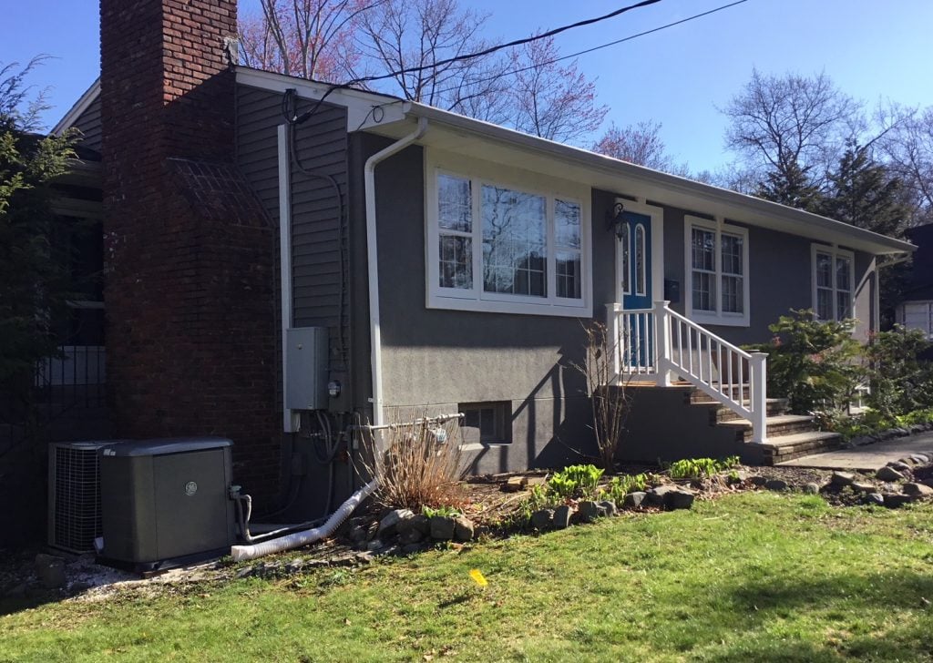 Newly Painted Stucco and Vinyl Home