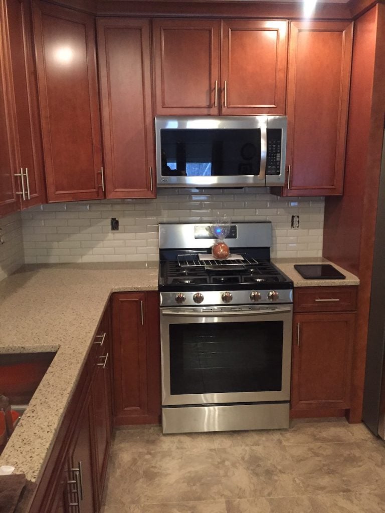 Stainless Steel Range and Tall Cabinets