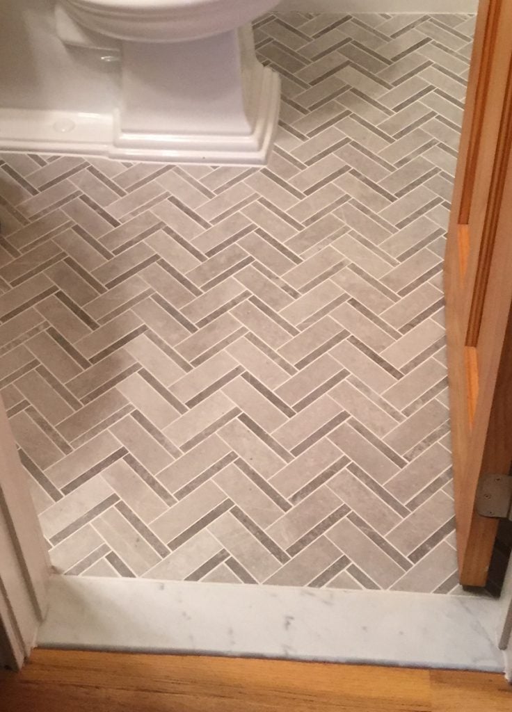 Herringbone Patterned Tile Floor