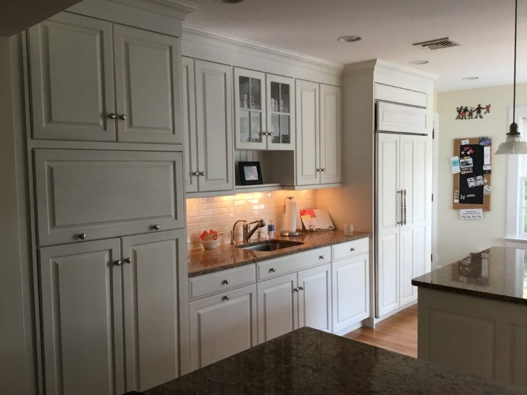 Row of white cabinetry after