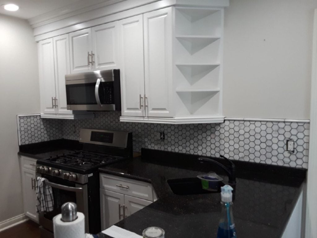 Bright Cabinets with New Backsplash