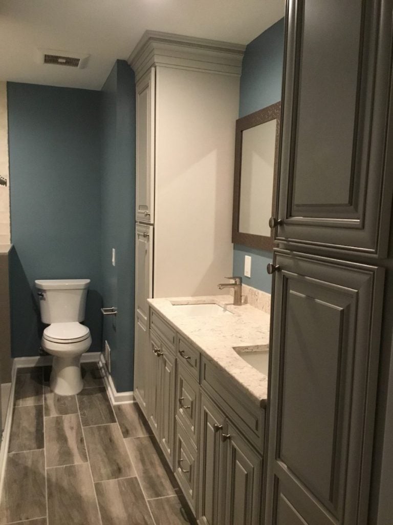 Floor to Ceiling Cabinetry Flanked Vanity