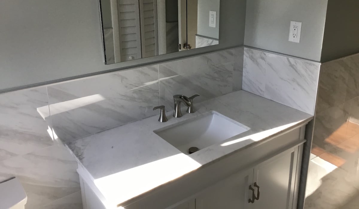 Vanity Tile Backsplash Ideas Monk S, Does A Bathroom Vanity Have To Backsplash