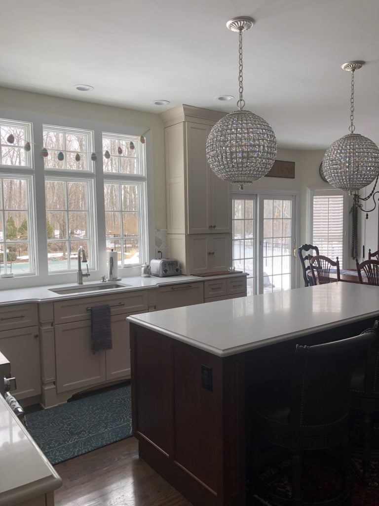 Crystal pendant lights above the island