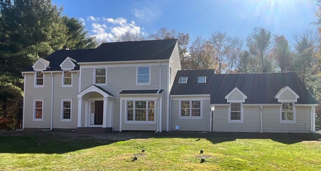 After new siding, new portico, new bay window