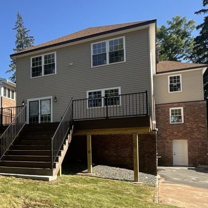 Back of home after addition and new deck