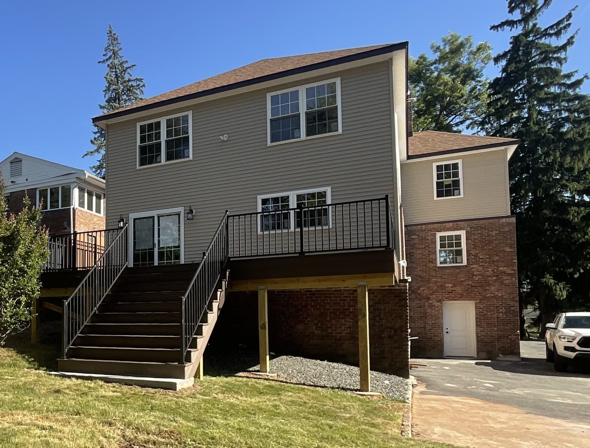 Back of home after addition and new deck